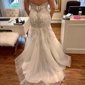 NEVER BEEN WORN- Wedding called off. Size 26 - not altered